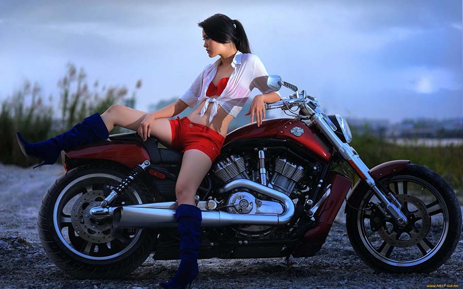 Beautiful girls and motorcycles in Belmopan